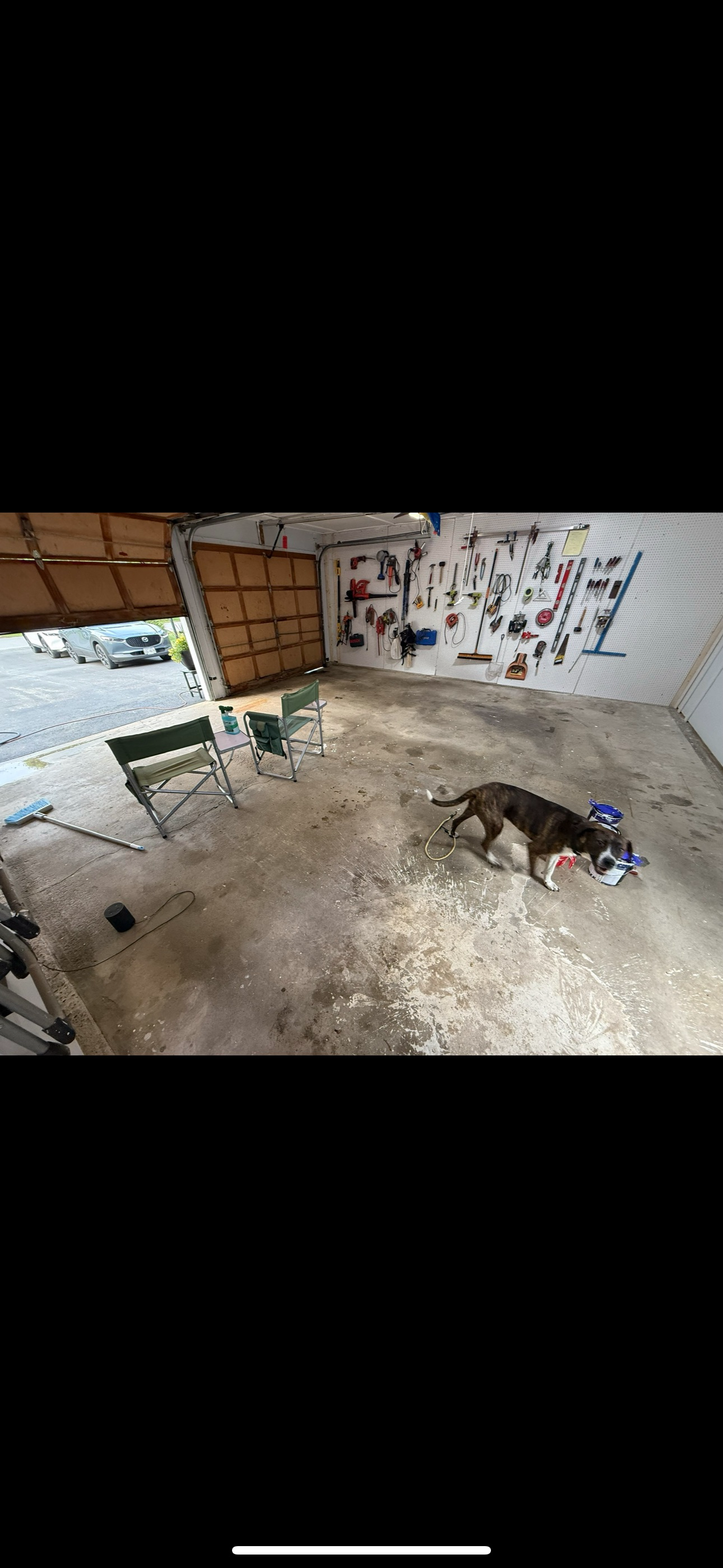 Before: bare concrete garage floor